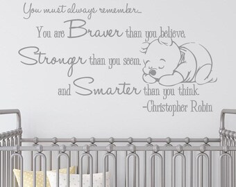 May include: A Winnie the Pooh wall decal with a quote from Christopher Robin: "You must always remember. You are Braver than you believe, Stronger than you seem, and Smarter than you think."