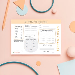 May include: A printable weekly planner notepad with a yellow and orange colour scheme. The notepad has sections for a no-spend day, a temptation list, a weekly goal, marketplace listings, a meal plan, wins and learnings, and a section to track savings. The notepad also includes the text "I'm Sensible with money notepad" and "WEEKLY PLANNER".