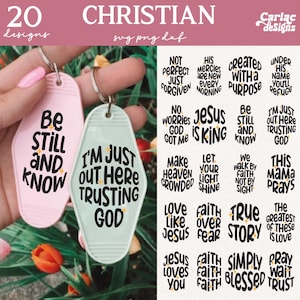 May include: Twenty Christian-themed keychains with various inspirational quotes and phrases. The keychains are in the shape of a motel key, with a pink and a light blue keychain. The keychains have a white background with black text and gold star accents.