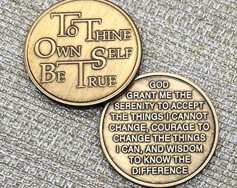 May include: Two gold-colored coins. One coin has the text "TO THINE OWN SELF BE TRUE". The other coin has the text "GOD GRANT ME THE SERENITY TO ACCEPT THE THINGS I CANNOT CHANGE, COURAGE TO CHANGE THE THINGS I CAN, AND WISDOM TO KNOW THE DIFFERENCE".