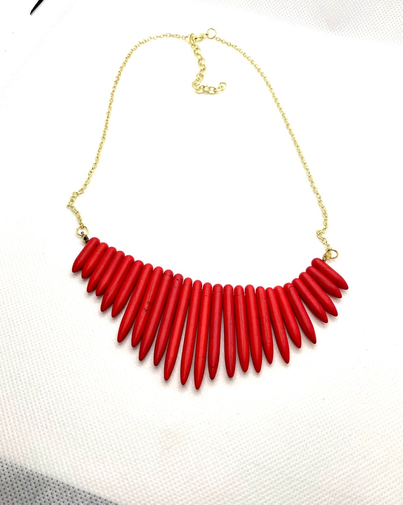 Red Graduated Bib Necklace With Gold Chain