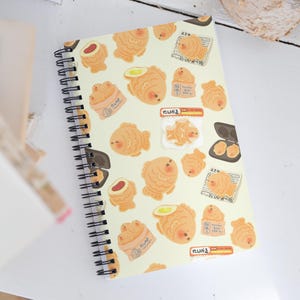 Caderno fofo Taiyaki com meia letra espiral pontilhada