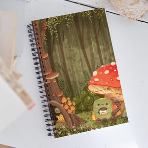 Cuaderno espiral de media letra con puntos de rana acogedor