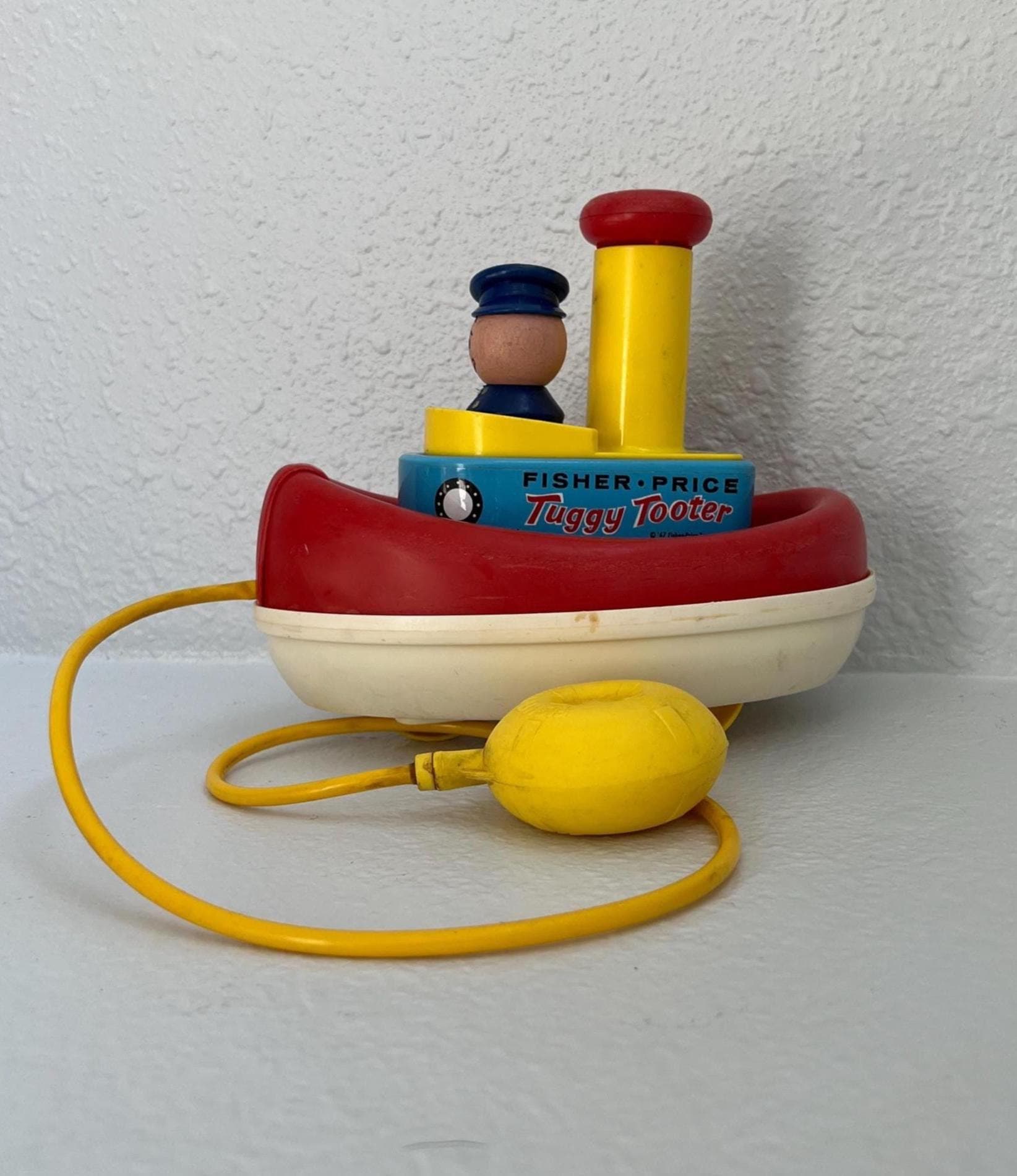 Collectible Fisher Price Tuggy Tooter Tug Boat Pull Toy Whistle Blows When  Pump Is Pushed 1967