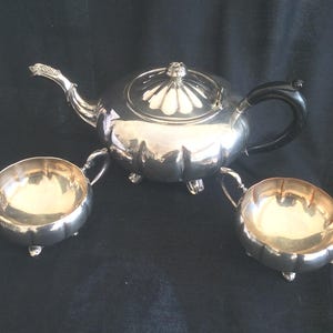 Three-Piece Marlboro Silver Plate Old English Reproduction E.P. Copper Tea Set
