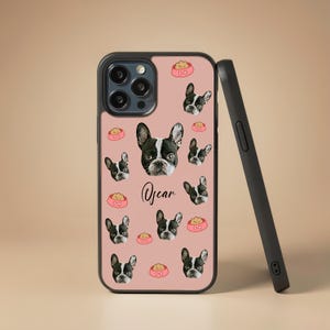 May include: A pink phone case with a repeating pattern of black and white French Bulldog faces, food bowls, and the name "Oscar". The case has a black border and a glossy finish.