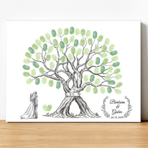Tree with footprints: 2 intertwined trunks with initials on wooden sign, married couple and floral crown - country wedding