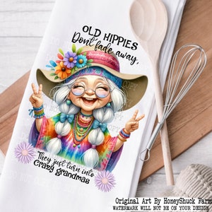 May include: A cartoon illustration of a smiling, older woman with long white hair and a tie-dye shirt. She is wearing a flower crown and a wide-brimmed hat. The text "OLD HIPPIES Don't fade away, They just turn into Crazy grandmas" is written below the woman.