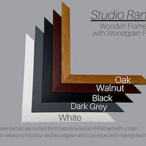 a range of wooden frames with different finishes, including oak, walnut, black, dark grey, and white. The frames are crafted from natural wood and finished with a stain, resulting in slight variations in color and woodgrain. The image emphasizes that these frames are unique, and slight variations in color and woodgrain are to be expected, making each piece unique.