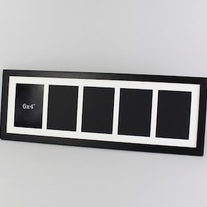 May include: A rectangular black picture frame featuring a white mat with five vertical openings. Each opening is designed to hold a 6x4 inch photograph. The frame has a clean, simple construction with a solid black border and a white inner mat.