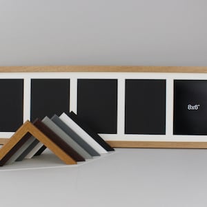 May include: A multi-aperture picture frame with a light wood finish, featuring five openings with black backing. The frame includes a white mount and a sample of frame corner options in various colours. One opening is labelled "8x6".