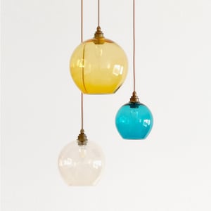 Cluster Pendant Light. Colored Glass Pendant Lights. Lights over Dining Table. Mid Century Modern Lighting. Custom Blown Glass Lighting.