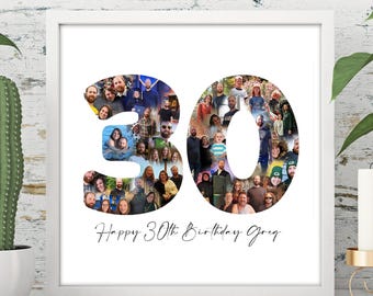 May include: A white framed print with the number "30" formed from a collage of photos. Below the number, in cursive script, is the text "Happy 30th Birthday Greg". The background is a white wood-panelled wall.