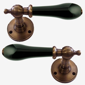 Black Porcelain Lever Door Handle On Rose Antique Brass
