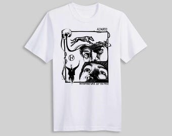 May include: White t-shirt with a black graphic design. The design includes a skull, a skeletal dog, and two sets of eyes. The word "ALWAYS" is at the top, and "INTENTIONS WILL SET YOU FREE" is at the bottom.