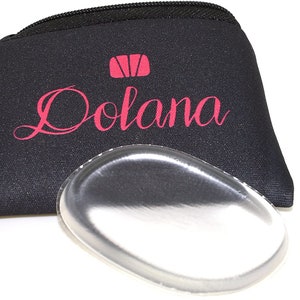 May include: A black zippered pouch with the word "Dolana" printed in pink. The pouch is open and a clear silicone heel pad is visible.