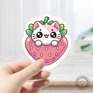 Cute cat inside a strawberry handmade sticker