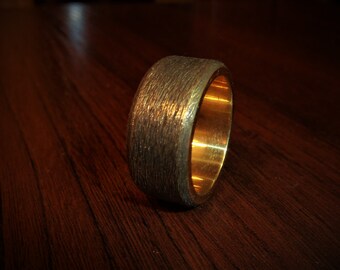 Handcrafted Brass Ring with hammered texture.