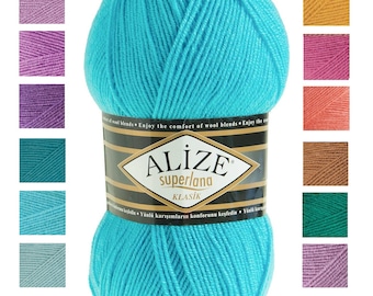 May include: A large ball of turquoise Alize Superlana Klasik yarn. The label features the brand name and the text "Enjoy the comfort of wool blends." Colour swatches of yarn are displayed on either side of the ball.