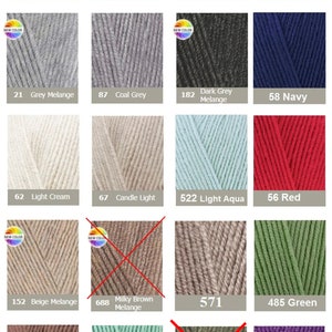 May include: A color chart of various yarn skeins, showcasing a range of hues. Colors include black, white, grey, and cherry red. Other colors are navy, light aqua, red, green, and purple. Each skein is labeled with a number and color name.