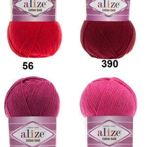 May include: Four skeins of Alize Cotton Gold yarn in shades of red, burgundy, and pink. Each skein is labeled with a color number: 56, 390, 649, and 149. The yarn is wrapped with a label that reads "cotton club alize Cotton Gold."