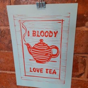 A4 I bloody love tea art print in blue/red. Based on a lino print.