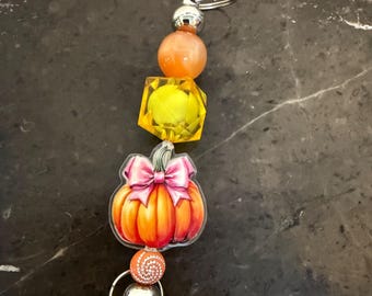 Ciondolo a forma di zucca autunnale da agganciare a borse, cerniere, ecc.
