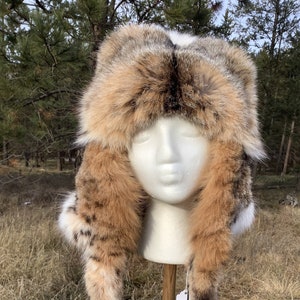 Bobcat Mongolian style fur hat with legs, feet and claws