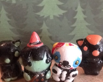Halloween edition cat witch bat and skeleton figurines