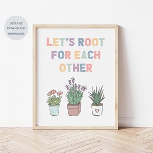 Op de afbeelding: Een printbare wandkunstprint met de tekst "Let's Root For Each Other" in regenboogkleuren. De print toont drie potplanten met bloemen en bladeren in een handgetekende stijl.