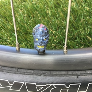 1 pair ..Rigamortis Rick....Walking Dead...Schrader Valve Caps..MTB..BMX..Bike
