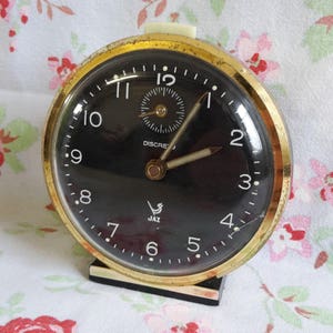 Vintage French Alarm Clock Jaz Discreto 1970s Retro Metal Working Fluorescent Hands + Button Rewind Mechanical Watch Wind Gold Cream Beige
