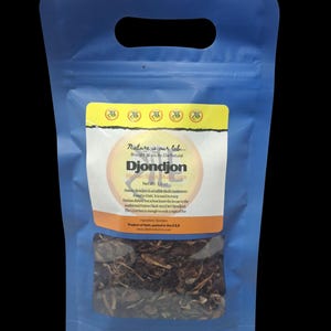 May include: A blue plastic bag with a clear window showing dried black mushrooms. The bag has a yellow label with the text "Nature is our lab..." and "Djondjon Haitian Black Mushrooms". The net weight is 42.5 grams.