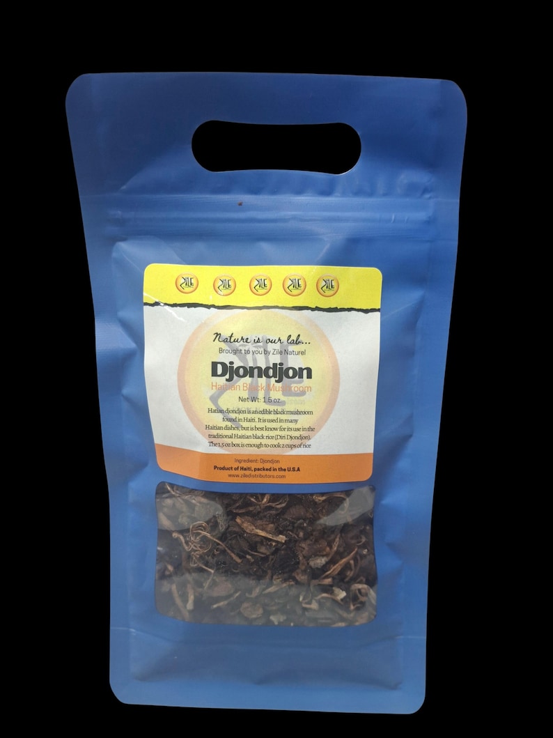 May include: A blue plastic bag with a clear window showing dried black mushrooms. The bag has a yellow label with the text "Nature is our lab..." and "Djondjon Haitian Black Mushrooms". The net weight is 42.5 grams.