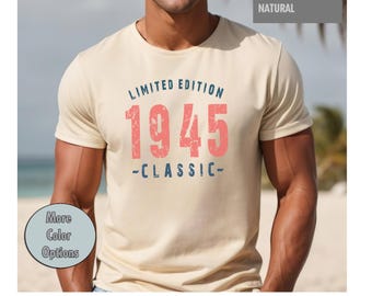 May include: A beige t-shirt with a vintage-style graphic that says "Limited Edition 1945 -Classic-" in blue and pink lettering.