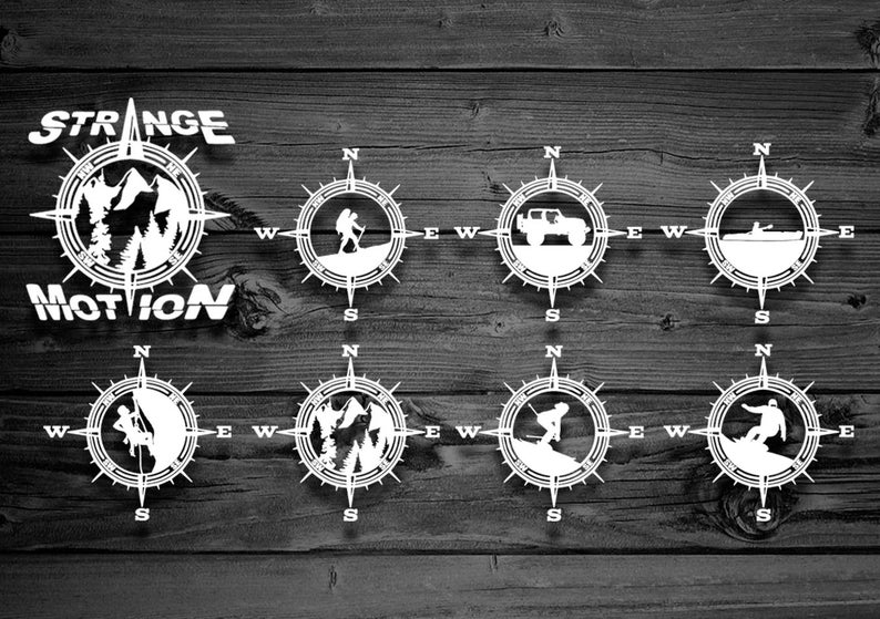 May include: Eight white compass designs with different activities, including hiking, driving, kayaking, and snowboarding. The text "STRANGE MOTION" is at the top of the image.