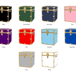 May include: A collection of square storage trunks in various colors, including black, forest green, navy blue, pink, purple, red, sky blue, royal blue, gray, and white. Each trunk has gold-colored hardware.