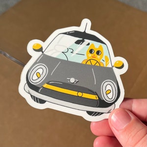 Cat Driving a Mini Cooper - Vinyl Sticker - Cute Matte Yellow and Gray Decal - MINI Cooper lovers!
