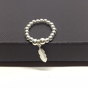 Feather Bead ring in Sterling silver, silver bead ring, dangle feather charm, stacking stretch ring, Valentine Gift Idea