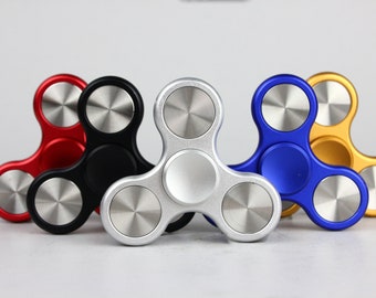 The Classic fidget spinner - tri shape metal spinner, in black, silver, blue, red, and orange