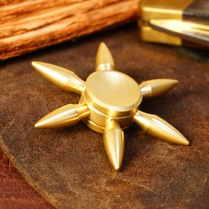 The AK Brass fidget spinner - 6 removable weights, large hand spinner