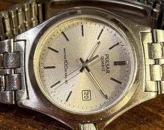 Orologio vintage Pulsar al quarzo, 36 mm, quadrante argentato, resistente all'acqua.