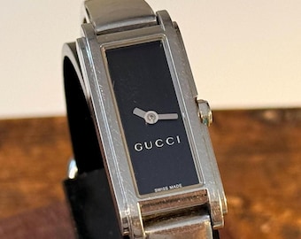 GUCCI ブラック文字盤 ブラックレザーストラップ クォーツ レディース