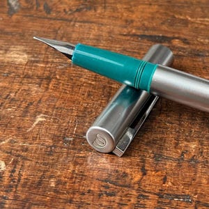 Vintage Waterman Fountain Pen - Blue Green Steel Body with Medium Nib, Classic Writing Collectible