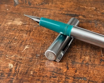 Vintage Waterman Fountain Pen - Blue Green Steel Body with Medium Nib, Classic Writing Collectible