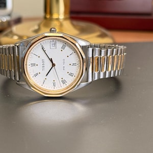 Tissot PR 100 Quartz Watch White Dial Roman Numerals Date Stainless Steel Classic Timepiece