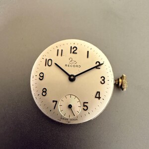 Vintage horloge uurwerk, Record Cal 660 26 mm, militaire Zwitserse onderdelen.