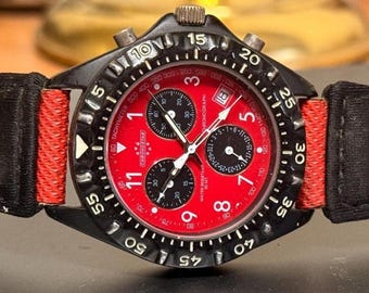Reloj de buceo cronógrafo Chronostar vintage con esfera roja y caja negra - Reloj automático retro para hombre