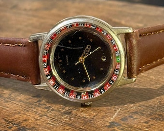 Einzigartige Roulette Lady Frauenuhr Quarz bewegliche Lünette Kugel