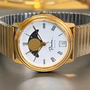 Vintage Piranha Paris Quartz Moon Phase Calendar Watch - Rare Gold Tone Case, Elegant Collectible Timepiece men unisex lady woman